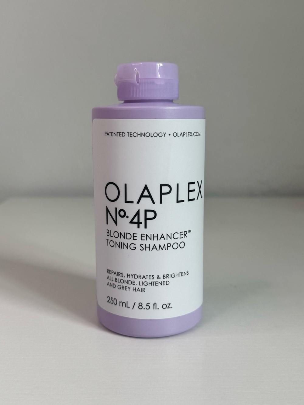 OLAPLEX No.4P Blonde Enhancer Toning Shampoo - Lavender & White